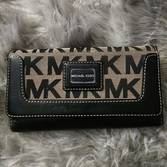 Michael Kors Handbags - EUC Michael Kores front flap wallet